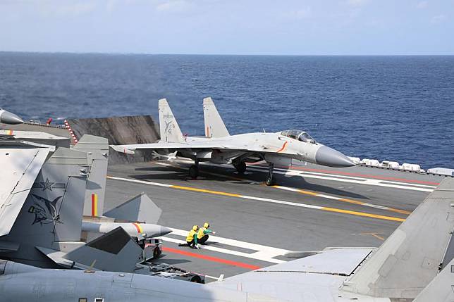 This photo taken on April 9, 2023 shows a J-15 fighter ready to take off from aircraft carrier Shandong during the combat readiness patrol and military exercises around the Taiwan Island carried out by the Eastern Theater Command of the Chinese People's Liberation Army (PLA). (Photo by An Ni/Xinhua)