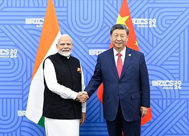 Chinese President Xi Jinping meets with Indian Prime Minister Narendra Modi on the sidelines of the 16th BRICS Summit in Kazan, Russia, Oct. 23, 2024. (Xinhua/Shen Hong)