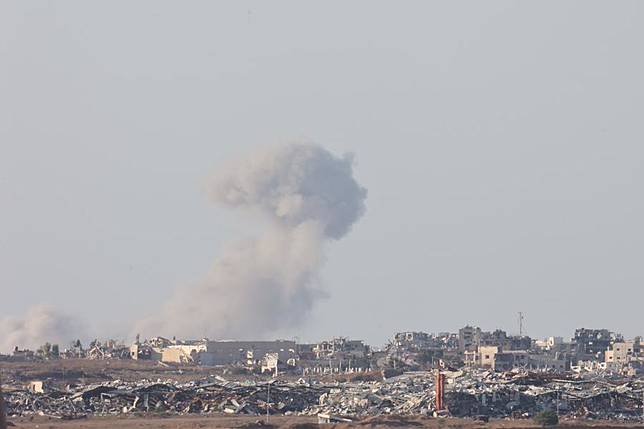 This photo taken on Aug. 11, 2024 shows destroyed buildings in the Gaza Strip, as seen from Israel's southern border with the Gaza Strip. (Photo by Gil Cohen Magen/Xinhua)