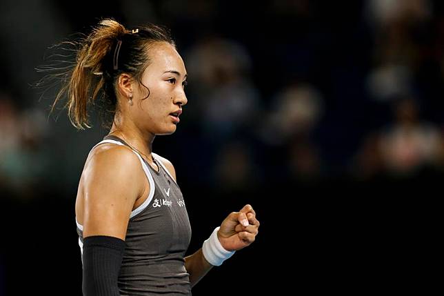 Zheng Qinwen celebrates scoring during the women's singles first round match against Anca Todoni of Romania at the 2025 Australian Open tennis tournament in Melbourne, Australia, Jan. 12, 2025. (Xinhua/Ma Ping)