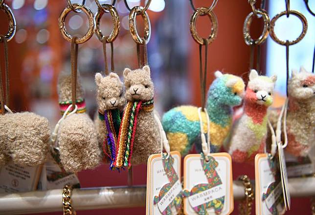 Alpaca toys are on display at the booth of Warmpaca during the seventh China International Import Expo (CIIE) in east China's Shanghai, Nov. 5, 2024. (Xinhua/Jin Mamengni)