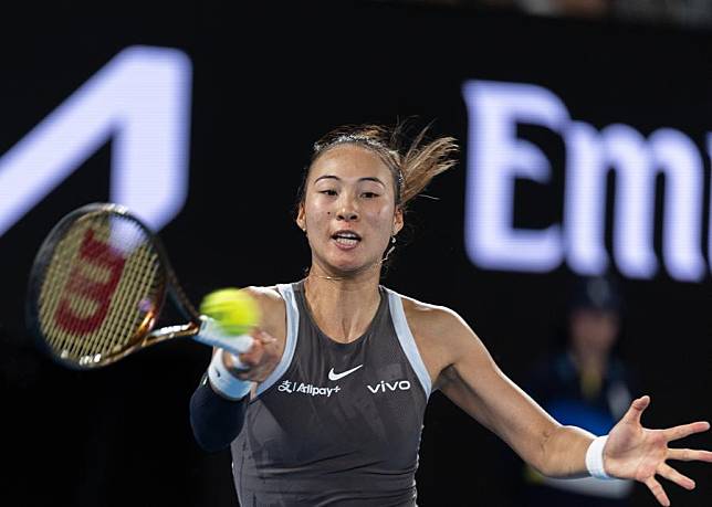 Zheng Qinwen hits a return during her women's singles 1st round win against Anca Todoni at the 2025 Australian Open in Melbourne, Jan. 12, 2025. (Photo by Hu Jingchen/Xinhua)