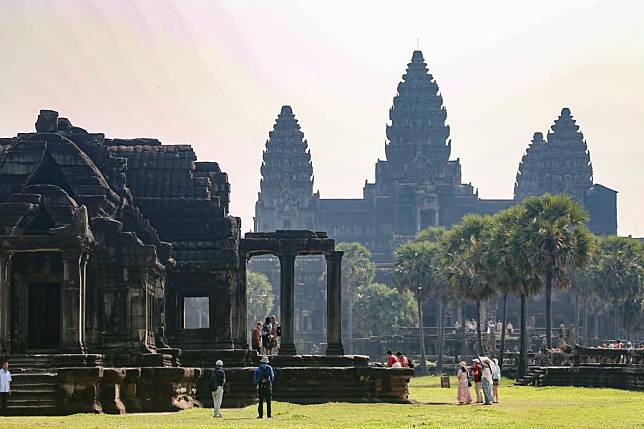 Tourists visit the Angkor Wat in Siem Reap province, Cambodia on Feb. 10, 2024. (Photo by Sao Khuth/Xinhua)