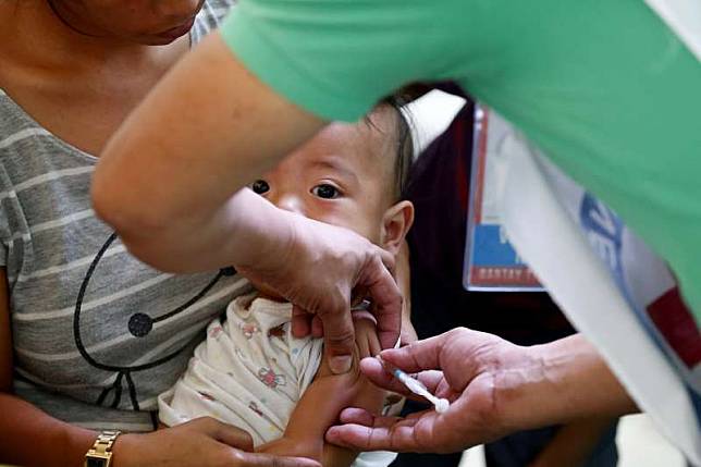 麻疹疫情升溫，疾管署今（23）日再新增10個麻疹案例。圖為嬰兒接種疫苗。（資料照，AP）