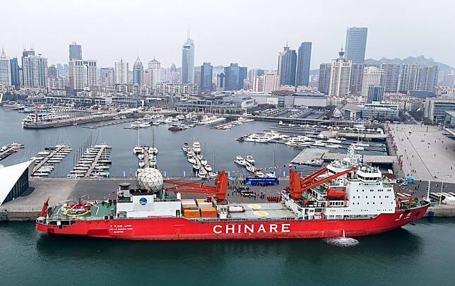 An aerial drone photo taken on April 10, 2024 shows the icebreaker Xuelong at a port in Qingdao, east China's Shandong Province. (Xinhua/Li Ziheng)