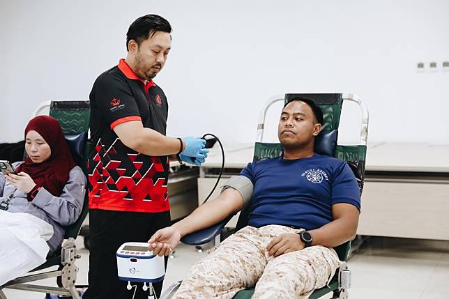 People participate in a blood donation event hosted by Hengyi Industries Sdn. Bhd. on the Great Muara Island in Brunei, Nov. 7, 2024. (Hengyi Industries/Handout via Xinhua)