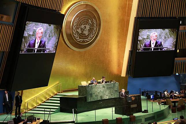 Fu Cong (at the podium and on the screens), China's permanent representative to the United Nations, introduces a draft resolution to establish the International Day for Dialogue among Civilizations at the UN General Assembly plenary session at the UN headquarters in New York, on June 7, 2024. (Xinhua/Xie E)