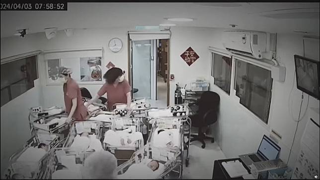 在地震發生的當下，護理師們用盡全力保護新生兒，避免被地震震倒。 圖：翻攝自 爆料公社 宋允瑛 分享影片