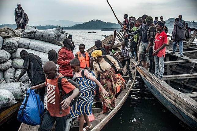 Displaced people are seen at the Nzulo port, near Goma, North Kivu province, eastern Democratic Republic of the Congo (DRC), on Jan. 23, 2025. (Photo by Zanem Nety Zaidi/Xinhua)