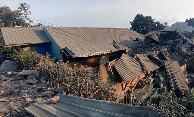 This photo shows damaged buildings after eruption of the Mount Lewotobi at East Flores in East Nusa Tenggara, Indonesia, Nov. 4, 2024. (East Flores Regional Disaster Management Agency/Handout via Xinhua)