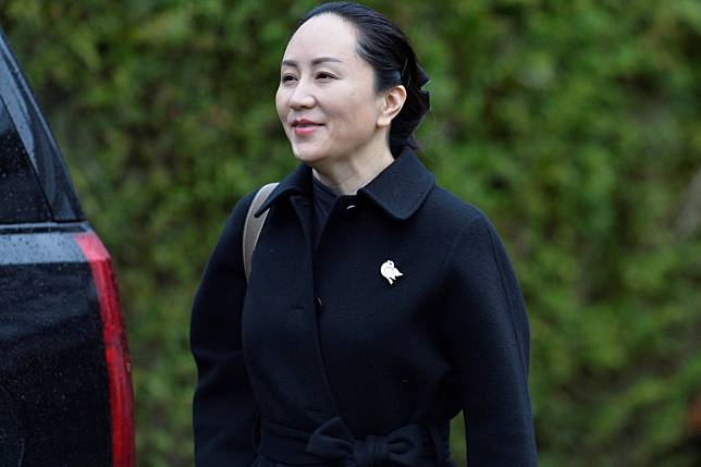 Meng Wanzhou, Huawei Technologies’ chief financial officer, leaving her home to attend her extradition hearing at British Columbia Supreme Court in Vancouver on Wednesday. Photo: Reuters