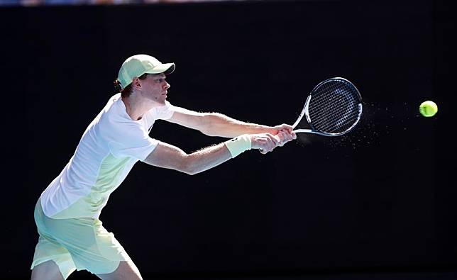 Jannik Sinner hits a return during the men's singles first round match between Jannik Sinner of Italy and Nicolas Jarry of Chile at Australian Open in Melbourne, Australia, Jan. 13, 2025. (Xinhua/Ma Ping)