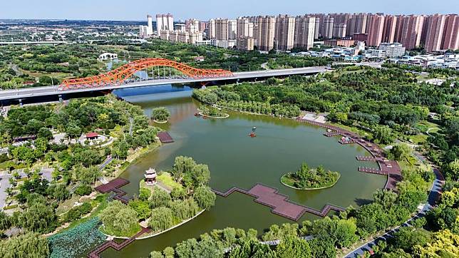 An aerial drone photo taken on June 21, 2024 shows scenery at the Wenquan River wetland park in Fuping County, Weinan City of northwest China's Shaanxi Province. (Xinhua/Zou Jingyi)