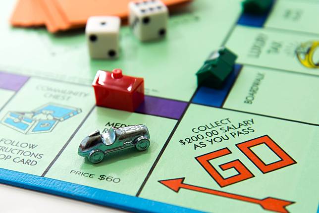 Monopoly board game in play