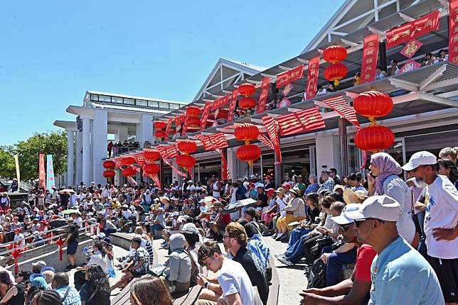 People watch performances during a festive Chinese New Year gala held at the Victoria and Alfred Waterfront in Cape Town, South Africa, on Jan. 25, 2025. (Photo by Sinqobile Mthimkhulu/Xinhua)