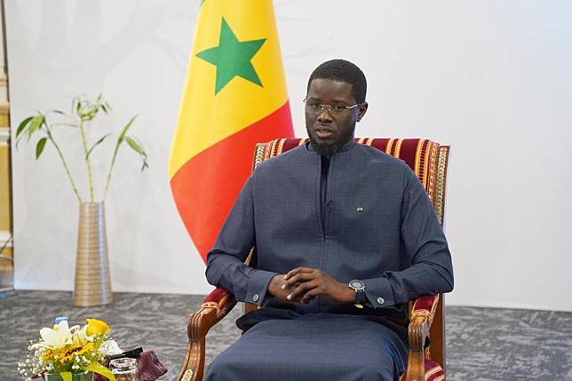 Senegalese President Bassirou Diomaye Faye talks to journalists in Dakar, capital of Senegal, Aug. 30, 2024. (Xinhua/Wang Zizheng)