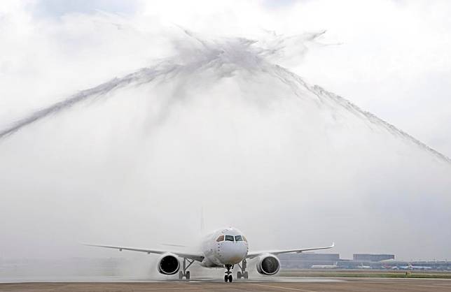 A C919 jetliner carrying more than 100 Hong Kong young talents receives a ceremonial water salute on its arrival at the Shanghai Hongqiao International Airport in Shanghai, east China, June 1, 2024. (Xinhua/Liu Ying)